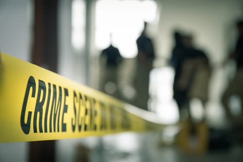 Crime,Scene,Tape,With,Blurred,Forensic,Law,Enforcement,Background,In - Homicide Defense Attorney in Nassau County NY